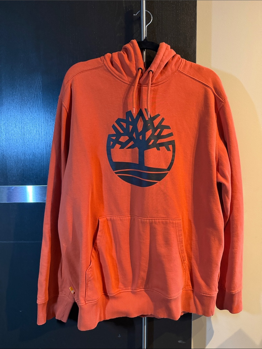 Timberland Orange Hooded Sweatshirt with Black Tree Emblem